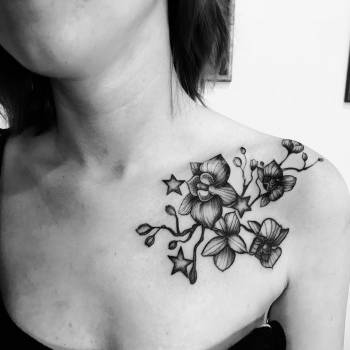 Тату для дівчат орхідея на ключиці, фото - Тату салон Unity Tattoo