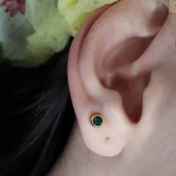 Прокол мочки уха