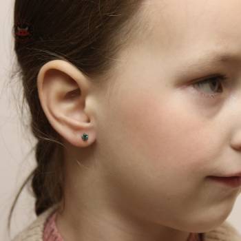 Пирсинг мочки уха