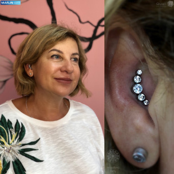 Пирсинг ушной раковины с кластером