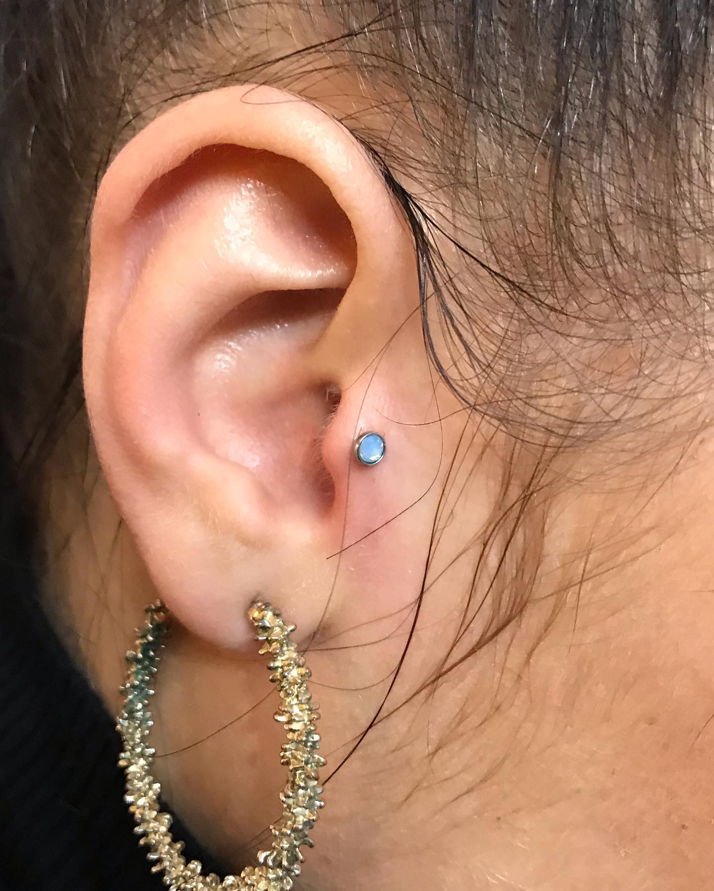 Пірсинг вуха мочки трагус, фото - Студія татужу Elf Tattoo