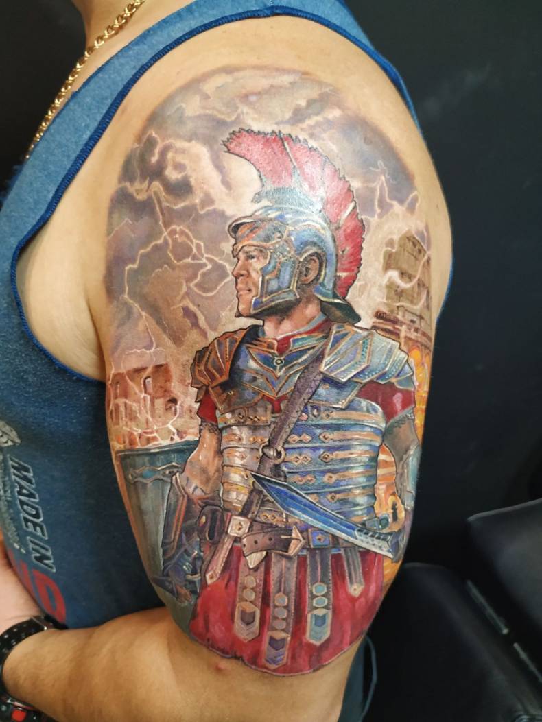 Мужские на плече цветные, фото -  Signum Tattoo Sumy