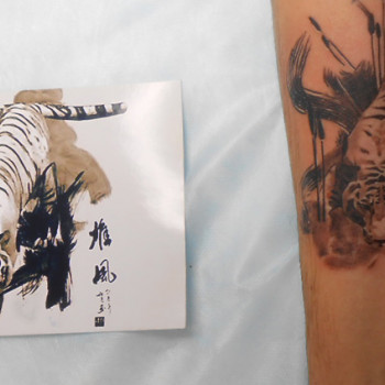 тигр тату на руці