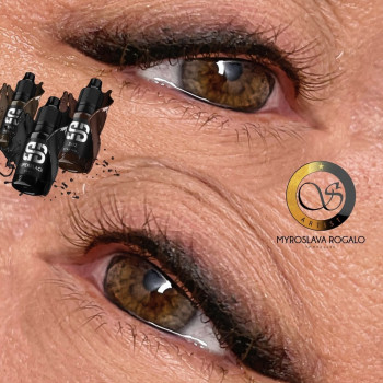 Розтушована стрілка на віковій шкірі