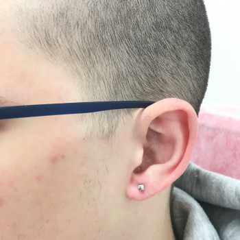 Пірсинг мочки вуха для парубка