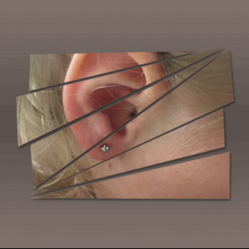 Прокол мочок вух дітям