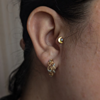 Прокол трагус    