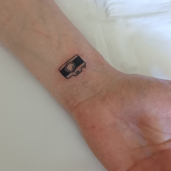 Татушка . Мини фотоаппарат

 
 
 