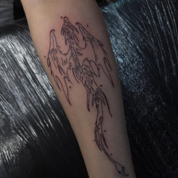 на передпліччі, дракон