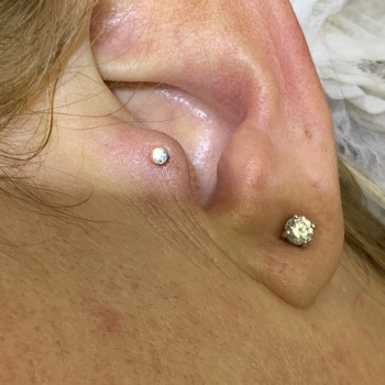 Пірсинг козелка вуха «Трагус»