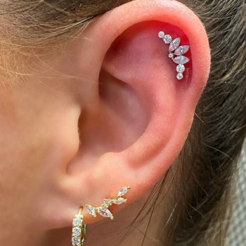 Пірсинг, хелікс , медична сталь . 
Стерильно , професійно , безболісно.