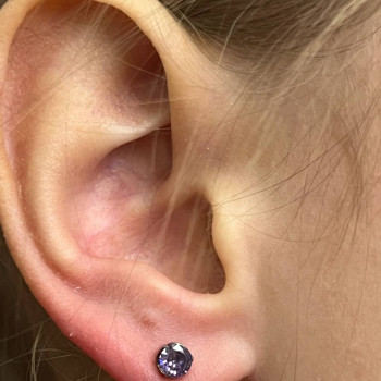 Прокол мочки