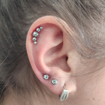 Пірсинг хелікс
   