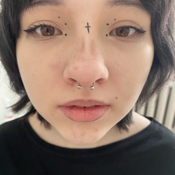 Прокол носа «Септум»