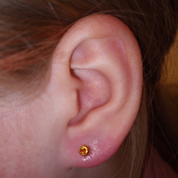 Дівчинка 10 років
Камінь топаз
   