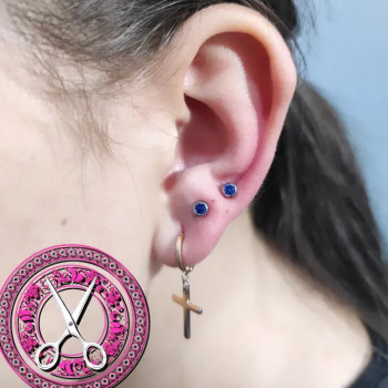 Подвійний прокол мочки пістолетом лоуб