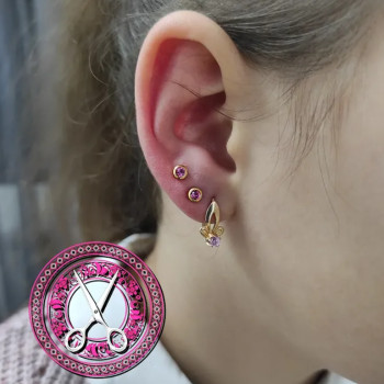 Подвійний прокол мочки пістолетом лоуб