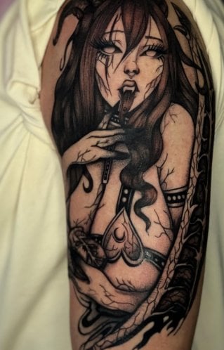 Женские змея на руке, фото - Тату салон TATTOO LAMARCH